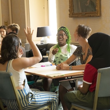 Catalyst summit - young women sitting around table